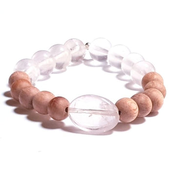 Handmade Rose Quartz and Rosewood Loving Nature Bracelet on white table